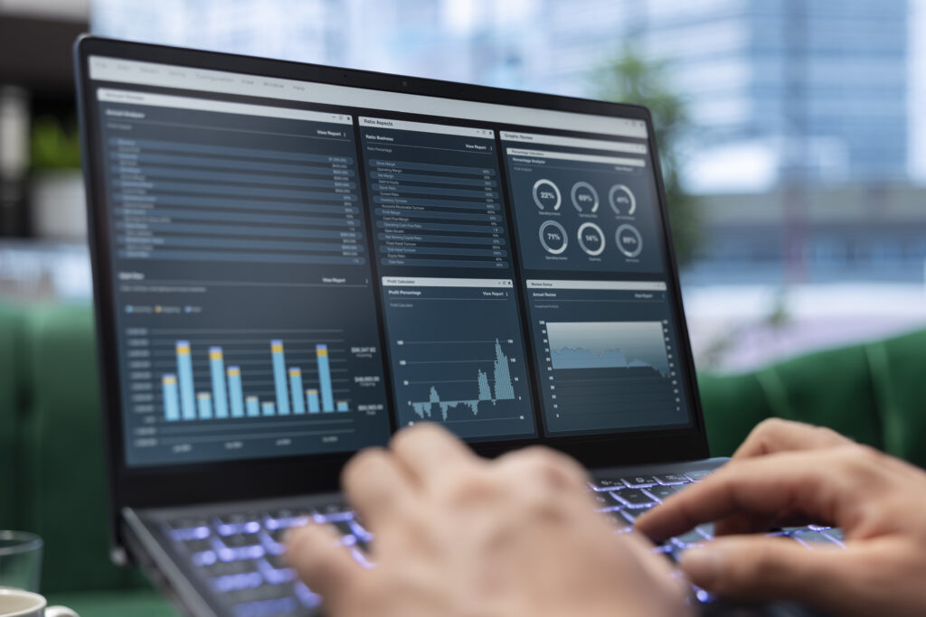 Goal oriented entrepreneur in a luxurious corporate office plans a strategy to ensure company future, reviewing market research and tracking expenses. Obtaining corporate achievement.